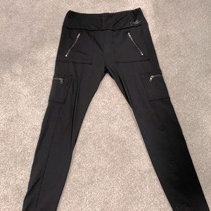 Never worn black leggings with 4 zip pocket details
